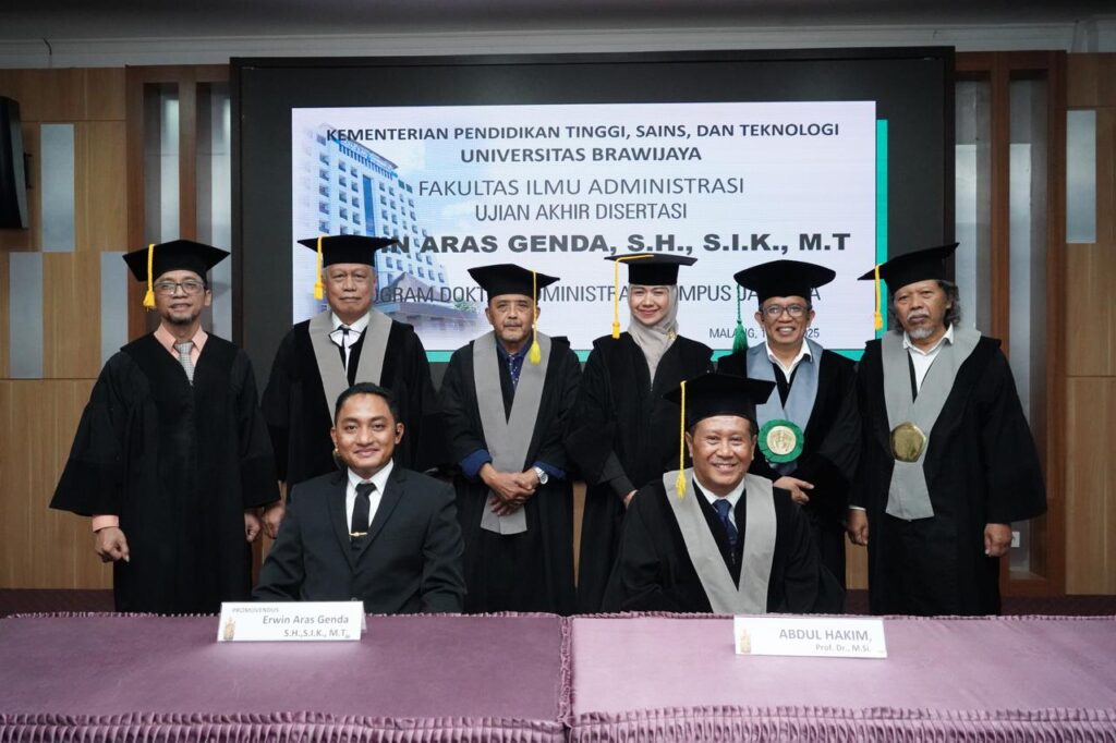 AKBP Erwin Aras Genda Raih Gelar Doktor, Kupas Digitalisasi Penegakan Hukum Lalu Lintas di Polda Sumsel